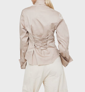 مشد الظهر القميص المناسب