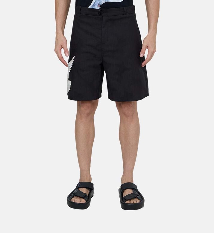 شورت قصير عريض الساقين بأجنحة غرافيكية بنفس اللون