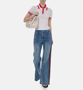 قميص بولو قصير الأكمام محبوك ومخطط