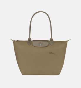 حقيبة يد كبيرة مطرزة بشعار العلامة