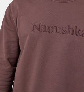 سويت شيرت ريمي مطرز بشعار