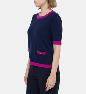 كنزة صوفية بجيوب أمامية بلون مغاير