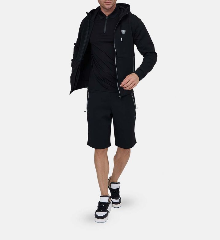 قميص بولو بياقة بسحاب وشعار