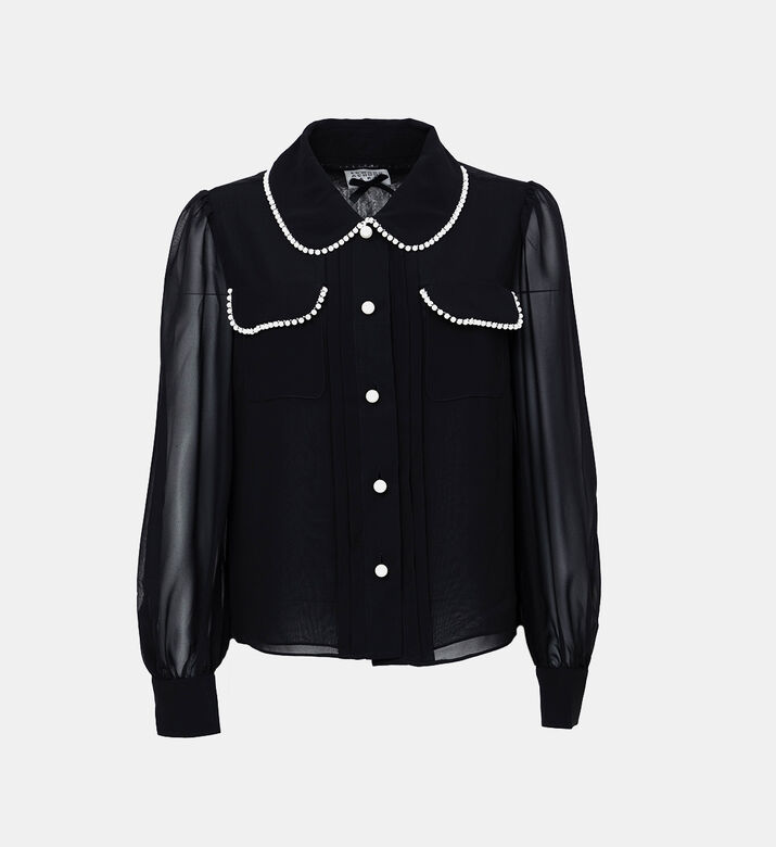 بلوزة بأكمام شفافة مطرزة بلؤلؤ