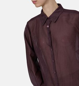 قميص شفاف بأكمام طويلة وصف أزرار