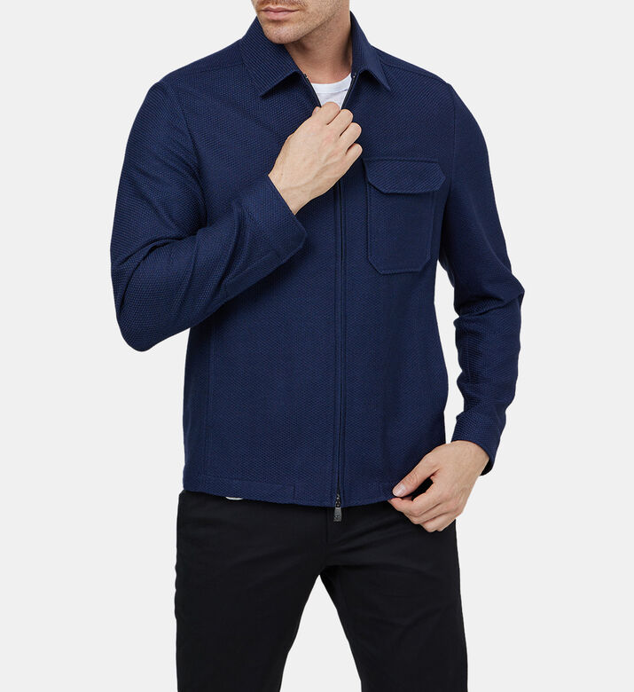 قميص فضفاض قطن بجيب أمامي بغطاء قلاب