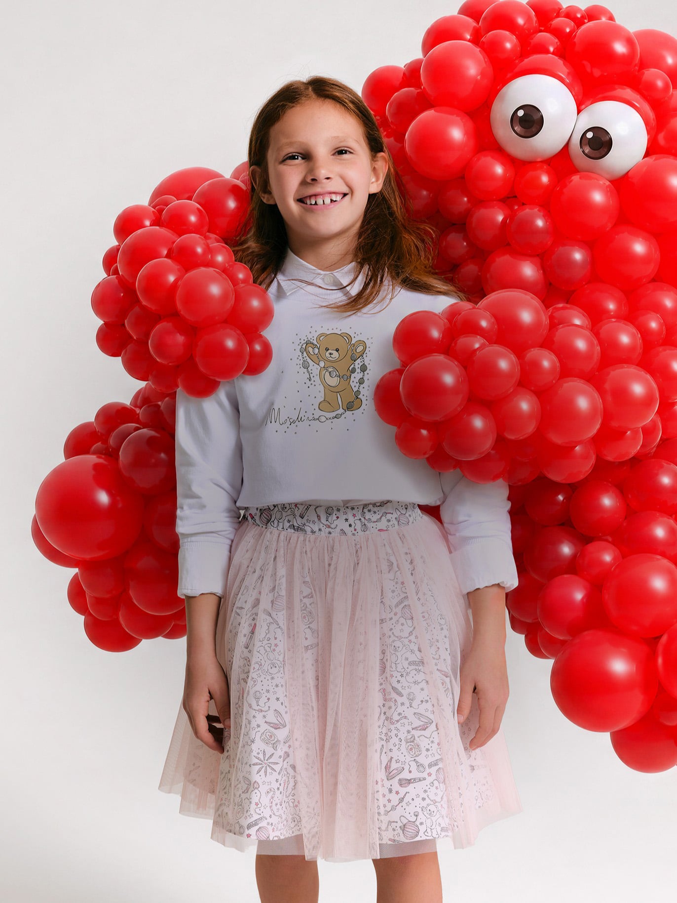 Image of kids in Moschino BKT outfits