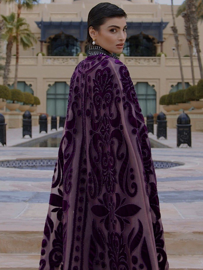 Image of a model in Ramadan outfit on beige background