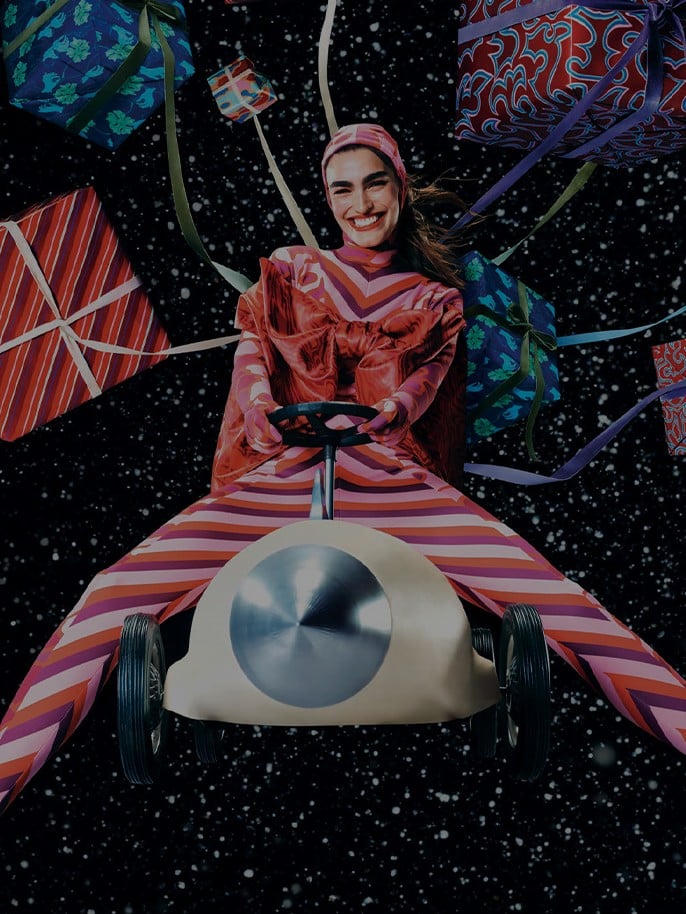 Image of a model in Xmas outfit on a skyline