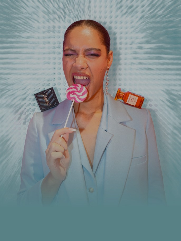 Image of model with sweets & beauty products 