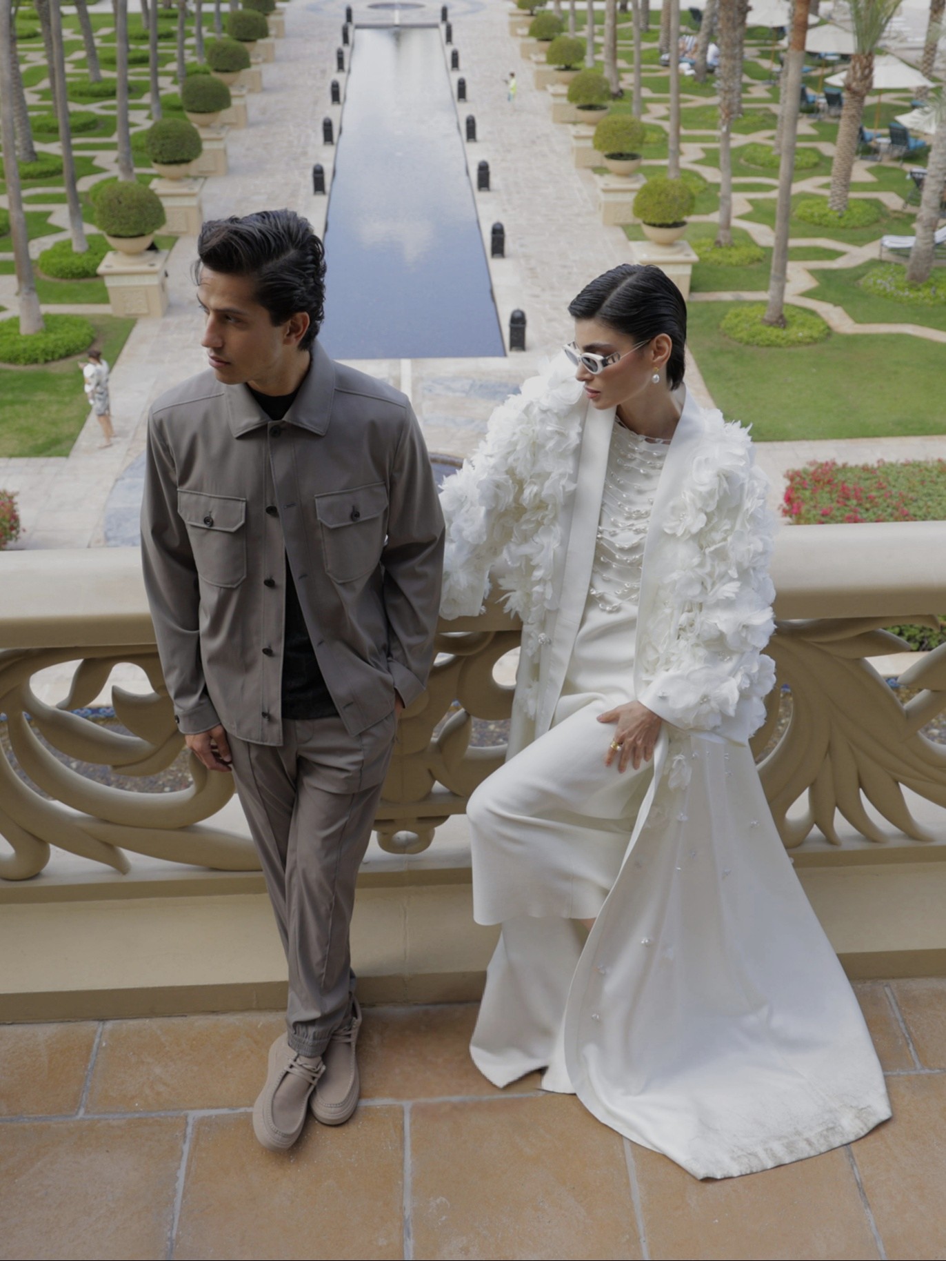 Image of a model in Ramadan outfit outside the hotel